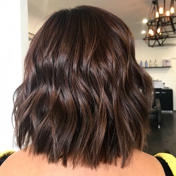 7 short haircuts for thick wavy hair