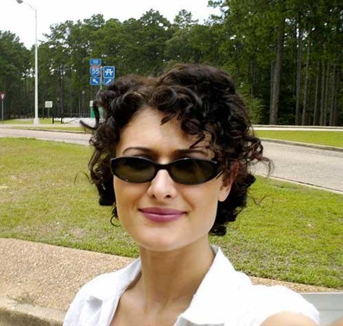 Short Curly Pixie with Dark Hair Style