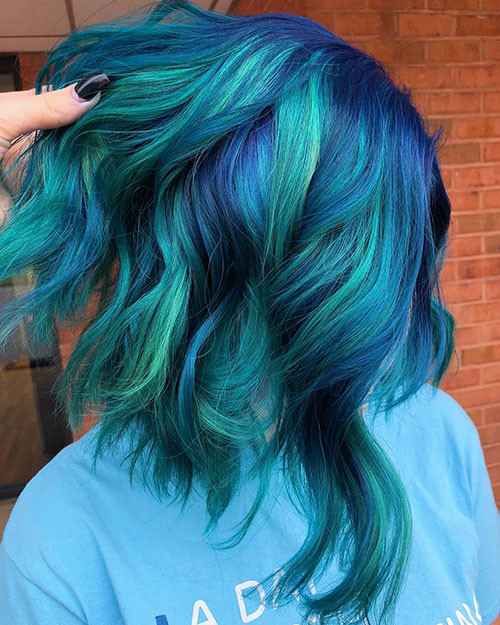 36 short hair with blue highlights