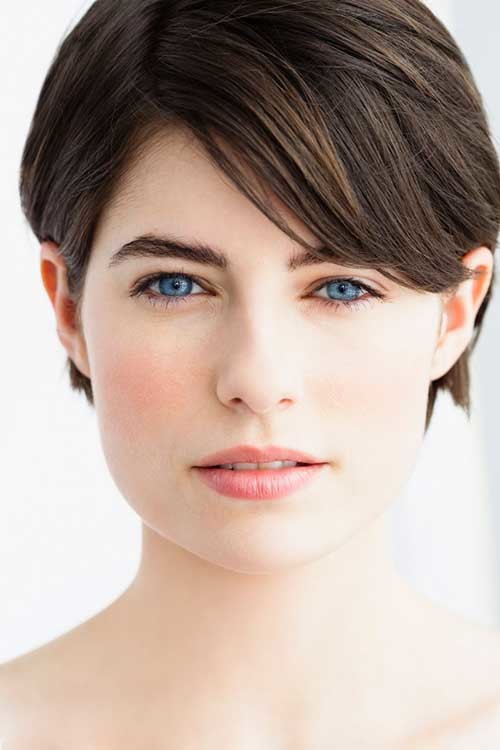 Longer Pixie Hairdo with Dark Brown Colored Hair