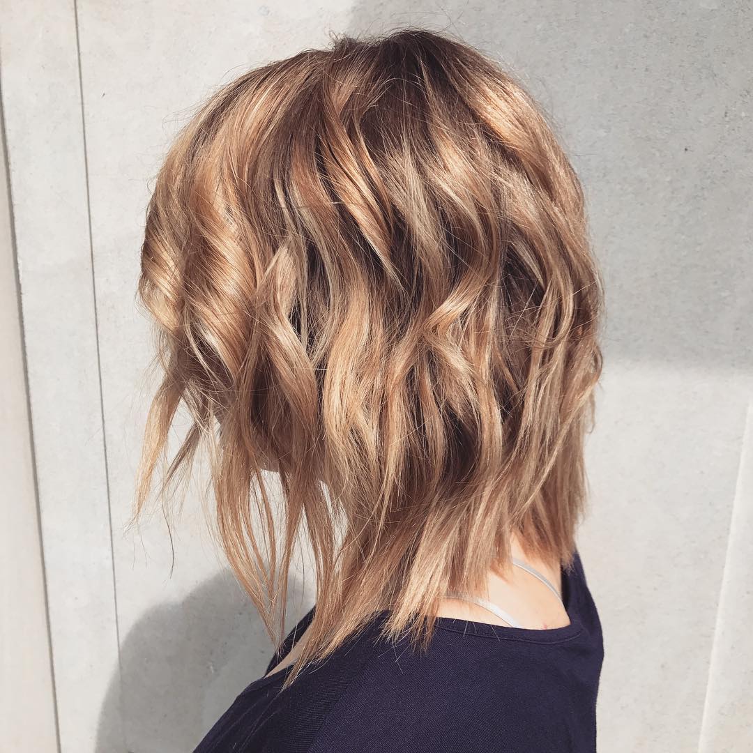 Chopped and Curled Asymmetric Bob