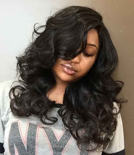 Bouncy Curls And Voluminous Bangs