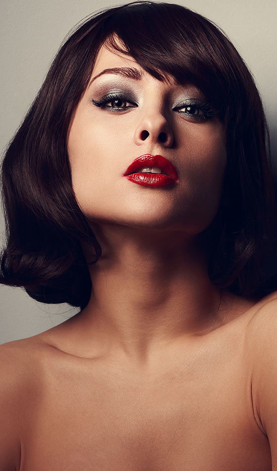 Outward Curls With Side Swept Bangs