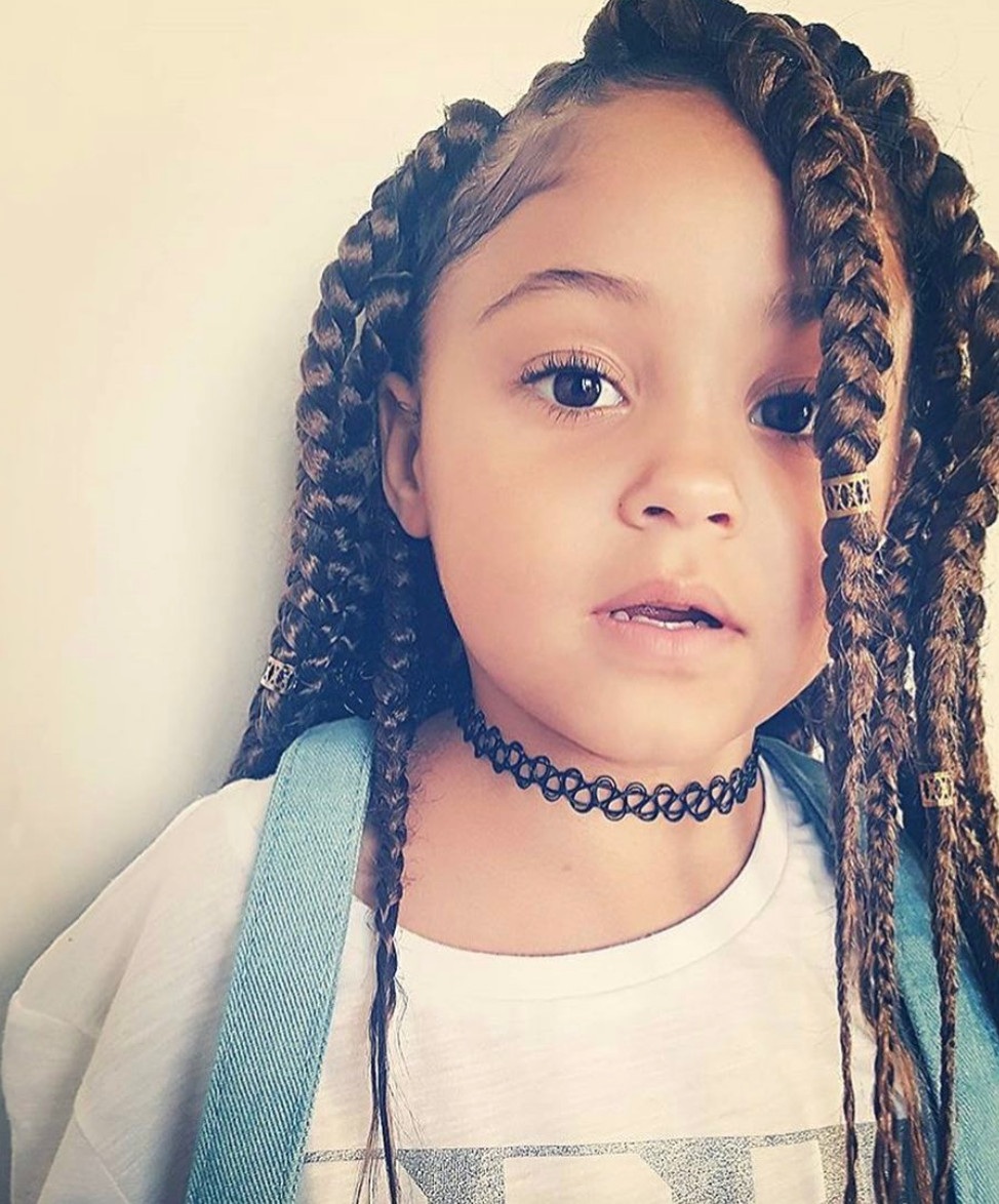 Reverse Braided Strands Scattered all over the Head Accessorized