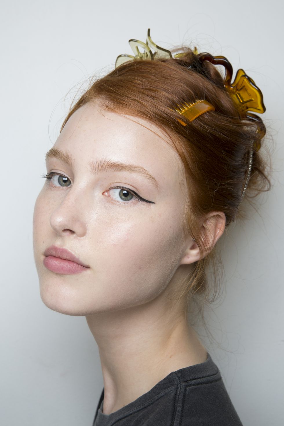 Bright Brown Hair Styled with Various Hair Accessories