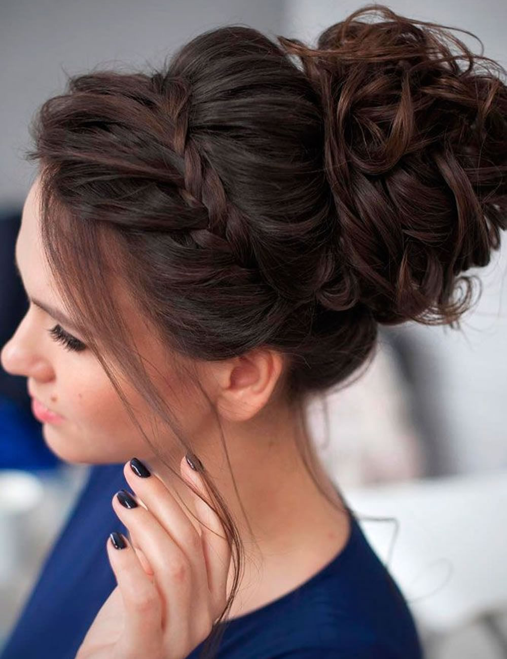 French Braided Puffed Bun with Curly Thin Hair Strands