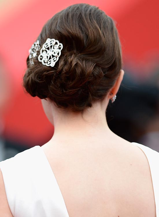Low Flowery Hairdo With Twisted Side