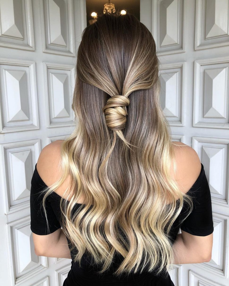 Middle sized hair with a knot at the back