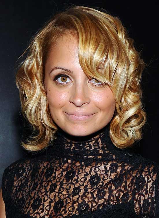 Retro Curly Bob With Dramatic Side Sweep