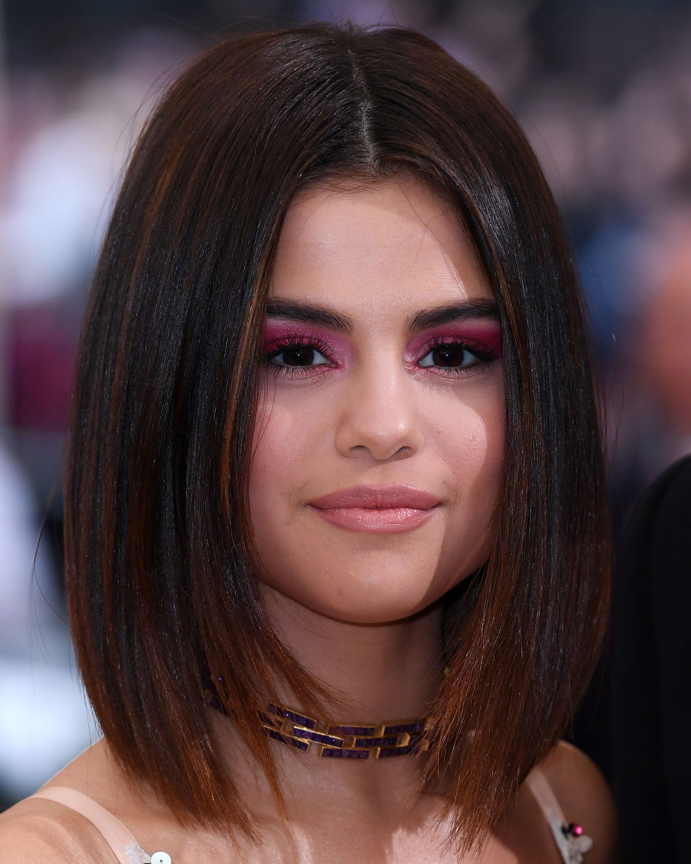 Short trendy hairstyle with straightened hair