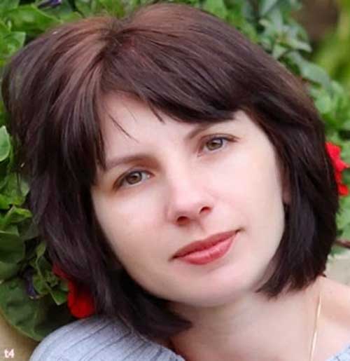 Cute Short Hairstyle for Thick Brown Hair with Bangs
