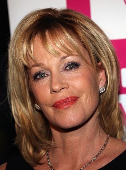 Medium Blonde Hair with Bangs and Layers