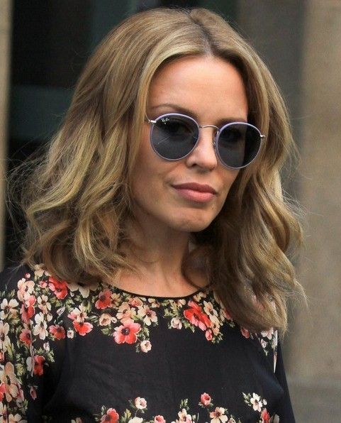 Medium Wavy Blonde Hair with Center Part
