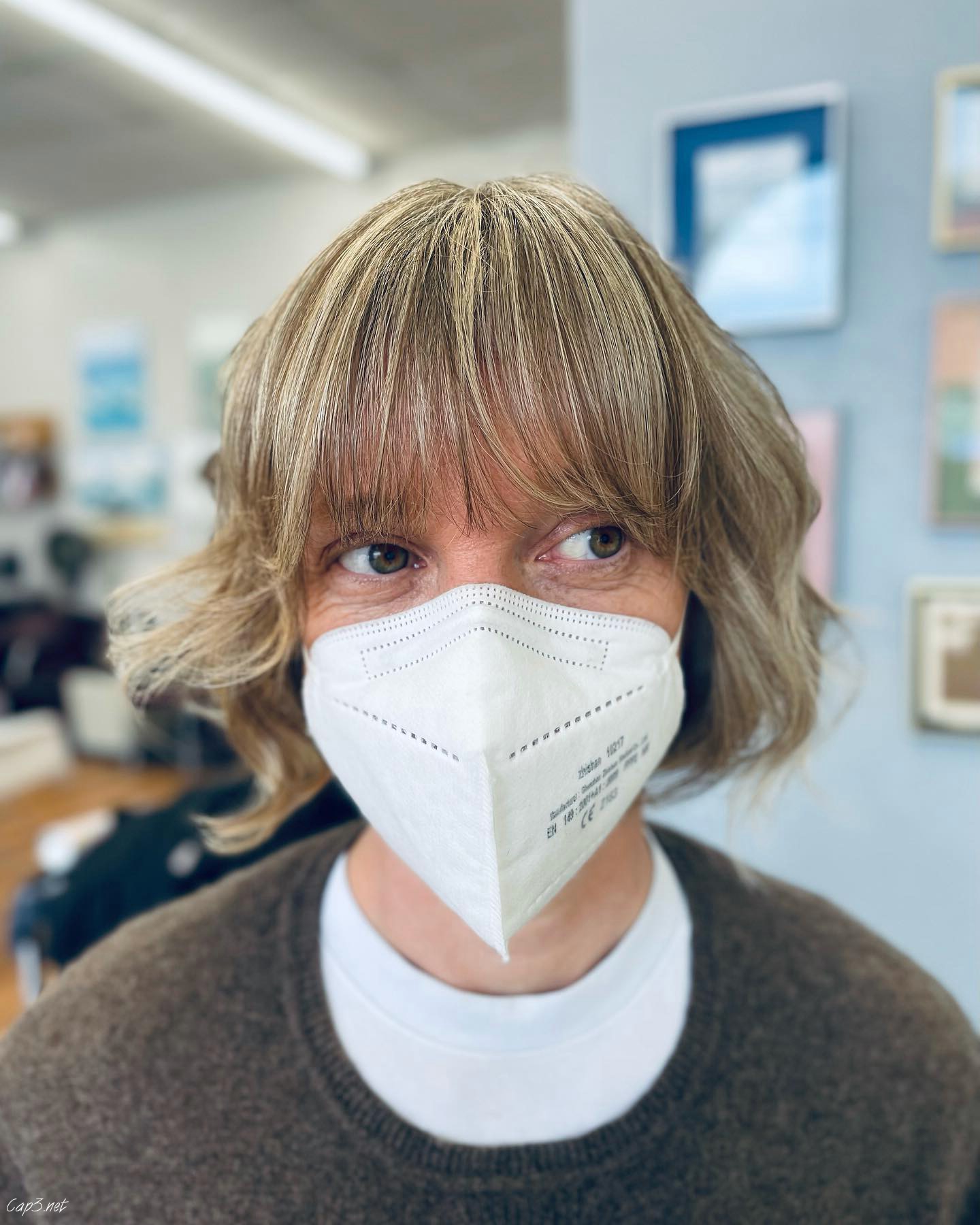 Blonde Layered Bob With Bangs