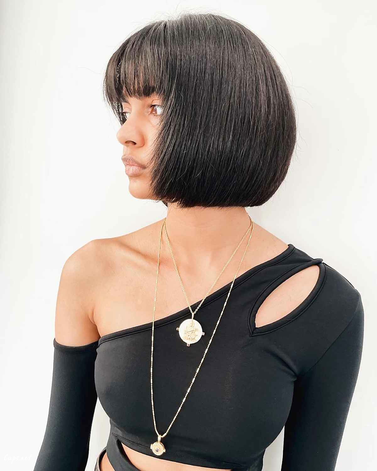 bob haircut with see through bangs