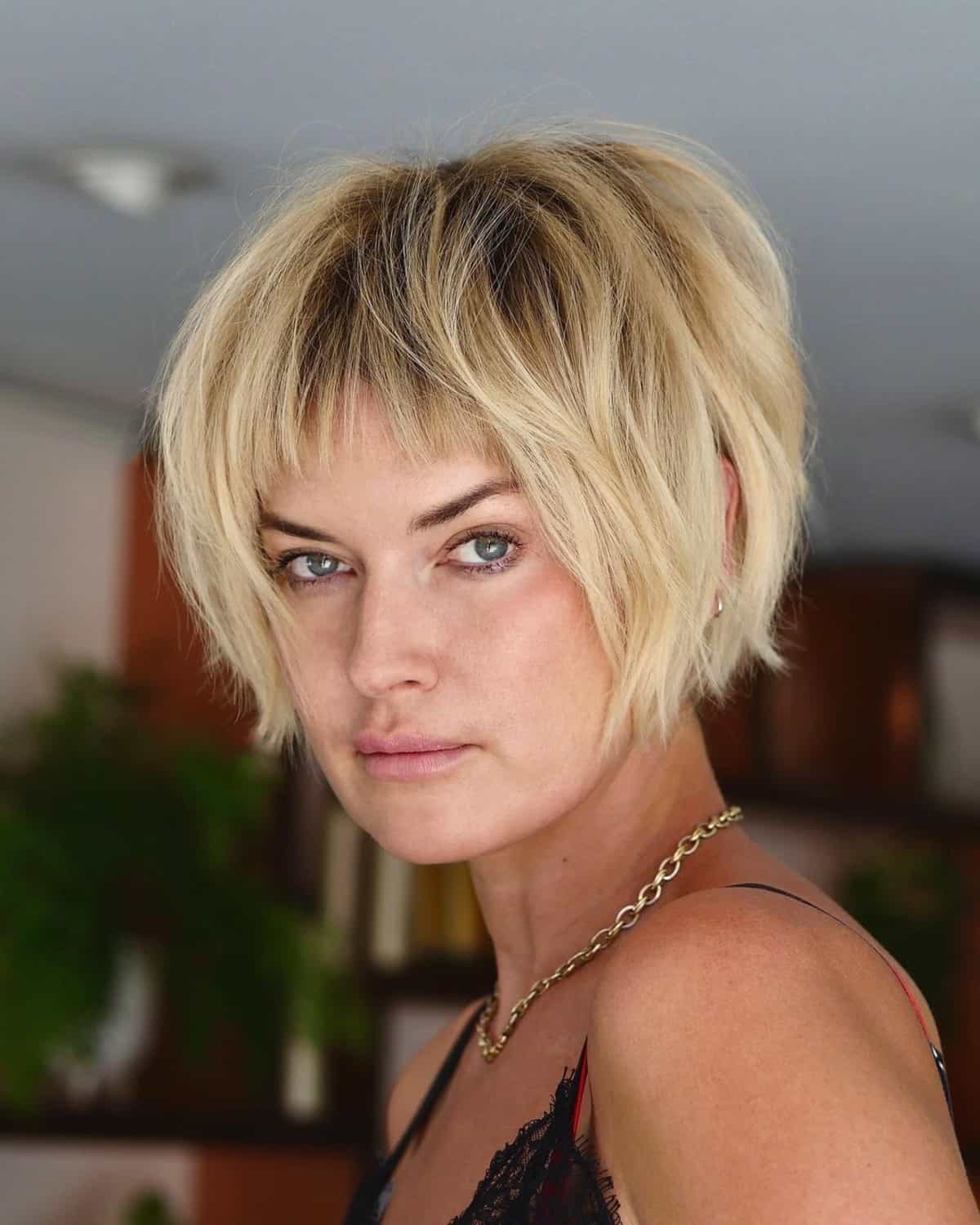 messy shaggy bob with bangs for over 40 1