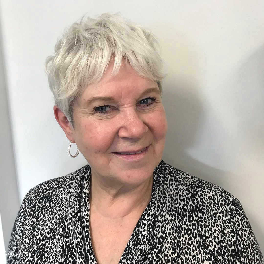 older woman with short shaggy wispy haircut