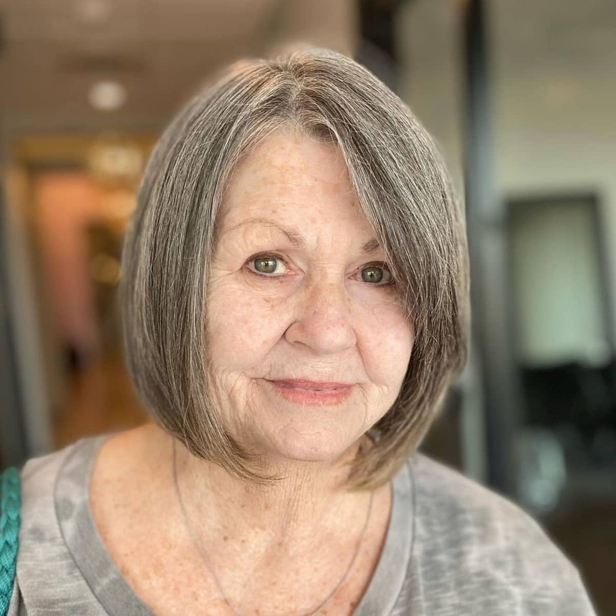 short stacked bob with side bangs