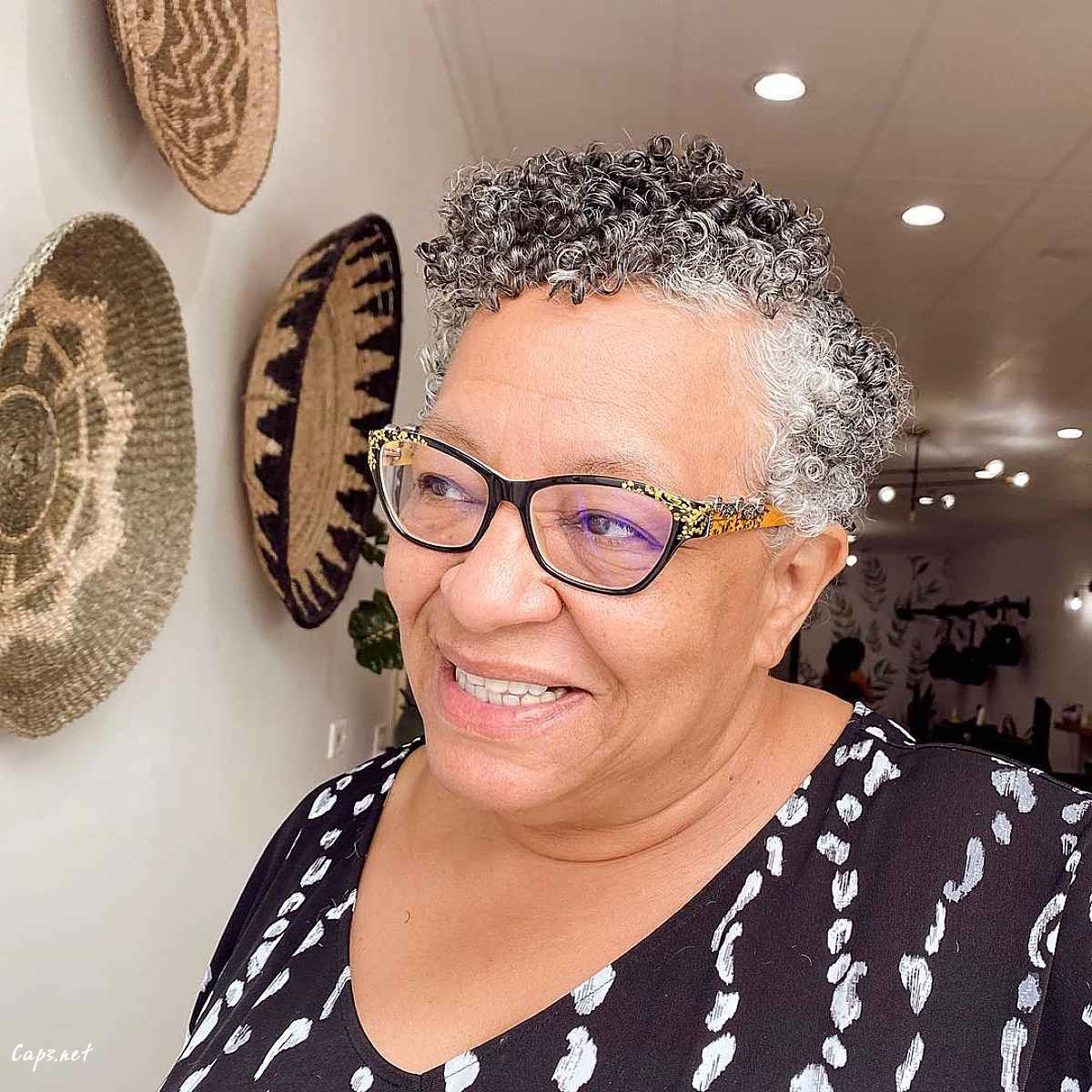 side parted pixie for older women with natural curls