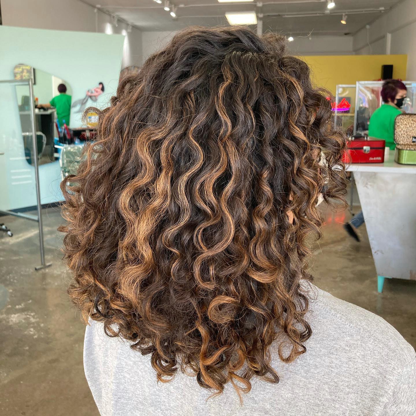 Curly Lob With Highlights