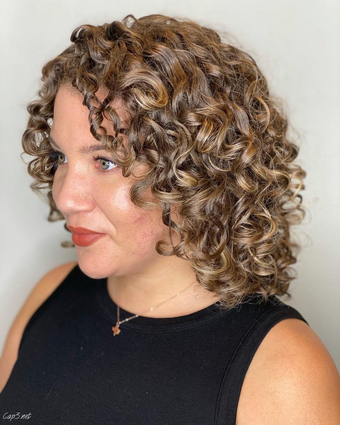 Rezo Cut Curly Hair Blonde Look
