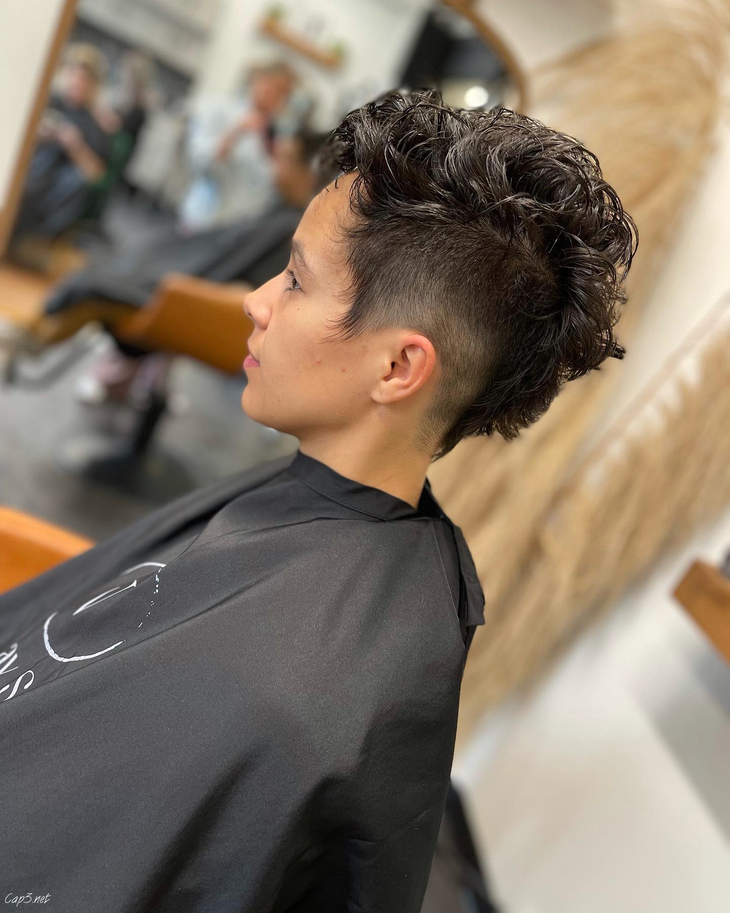 Shaved Sides Faux Hawk Look