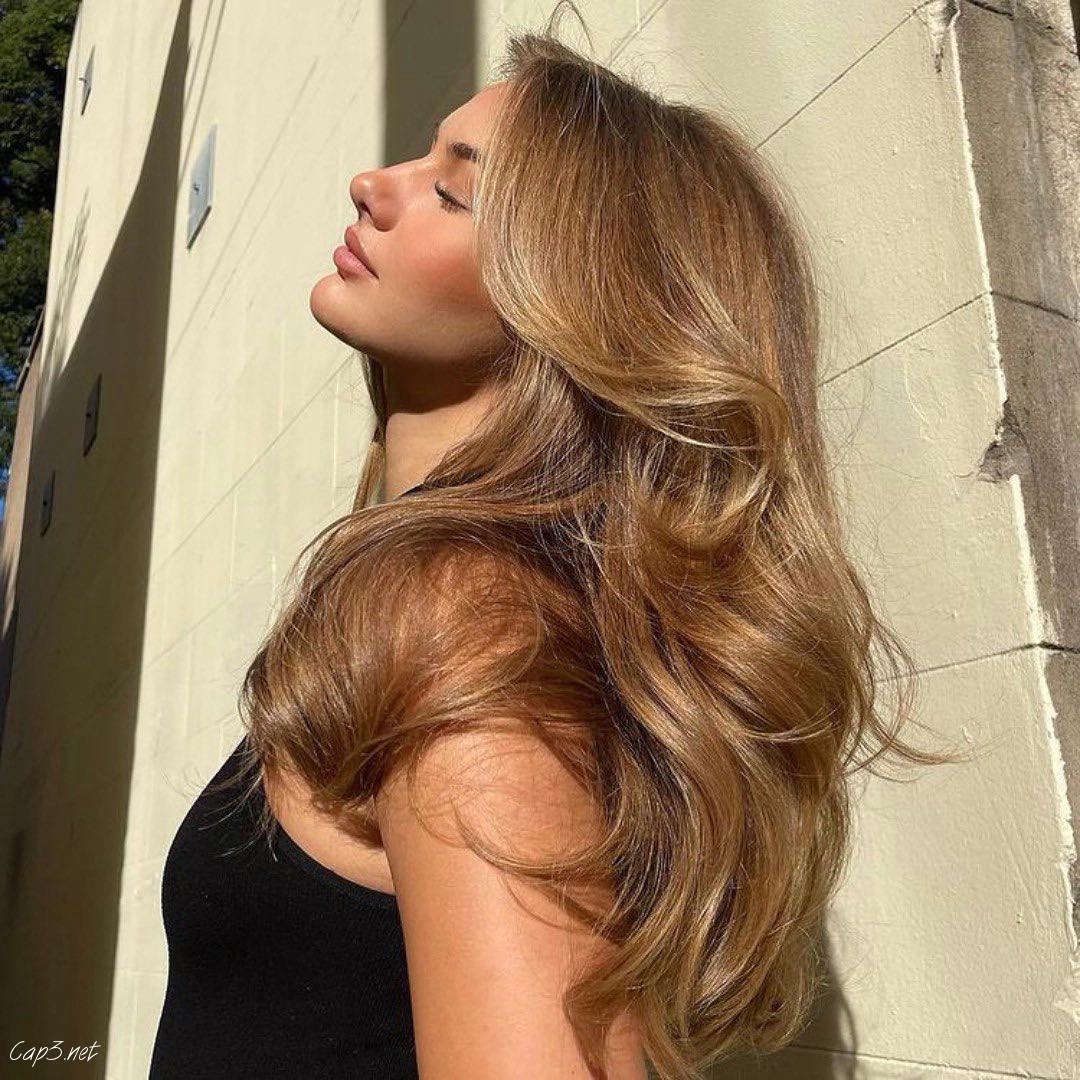 Voluminous Blonde Layered Hair