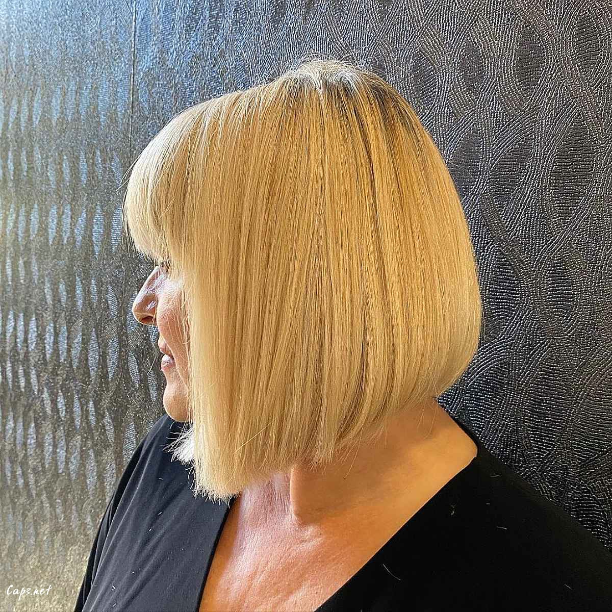 angled bob with bangs for women past their 60s