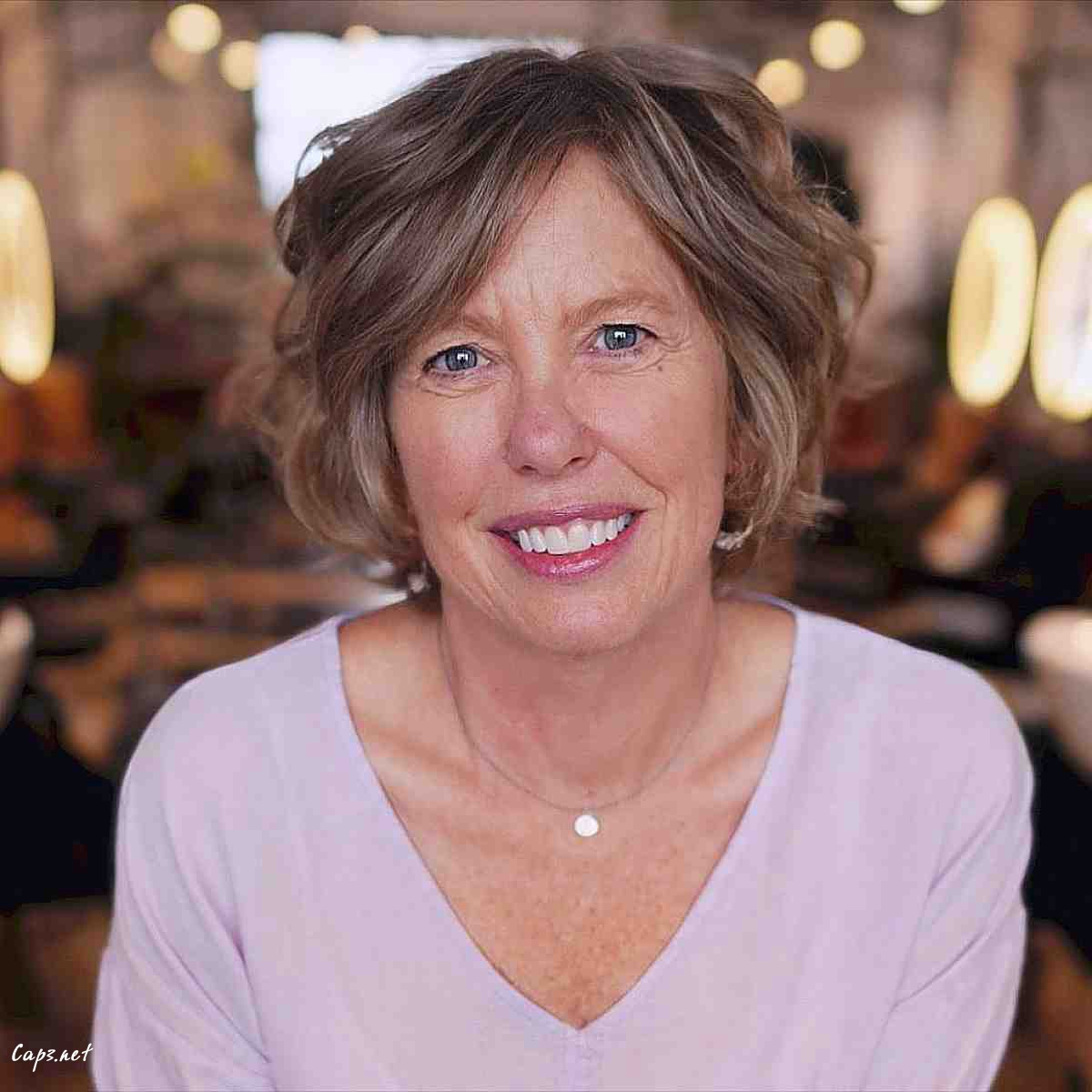 classy jaw length bob with long bangs for ladies over 60