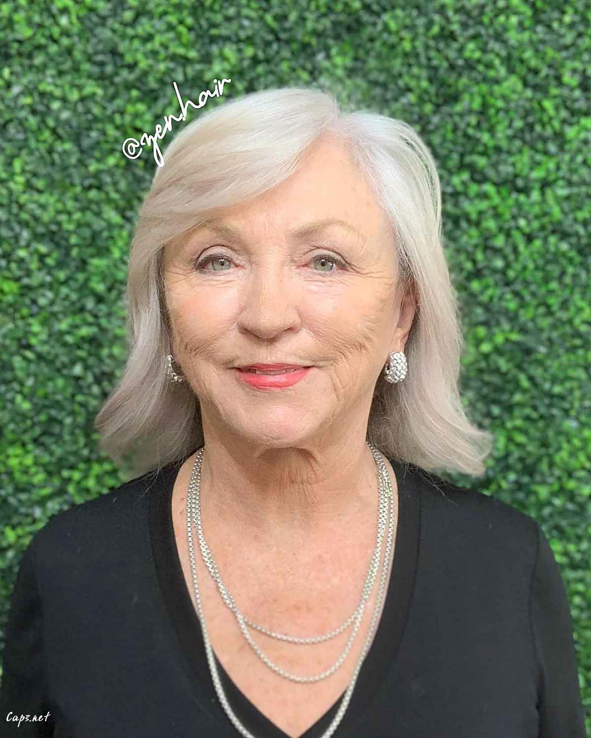 classy mid length cut with a side part for women 60 and up