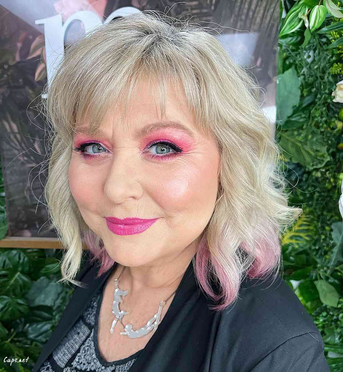 curled bob with pink dip dye for older ladies with thinning hair