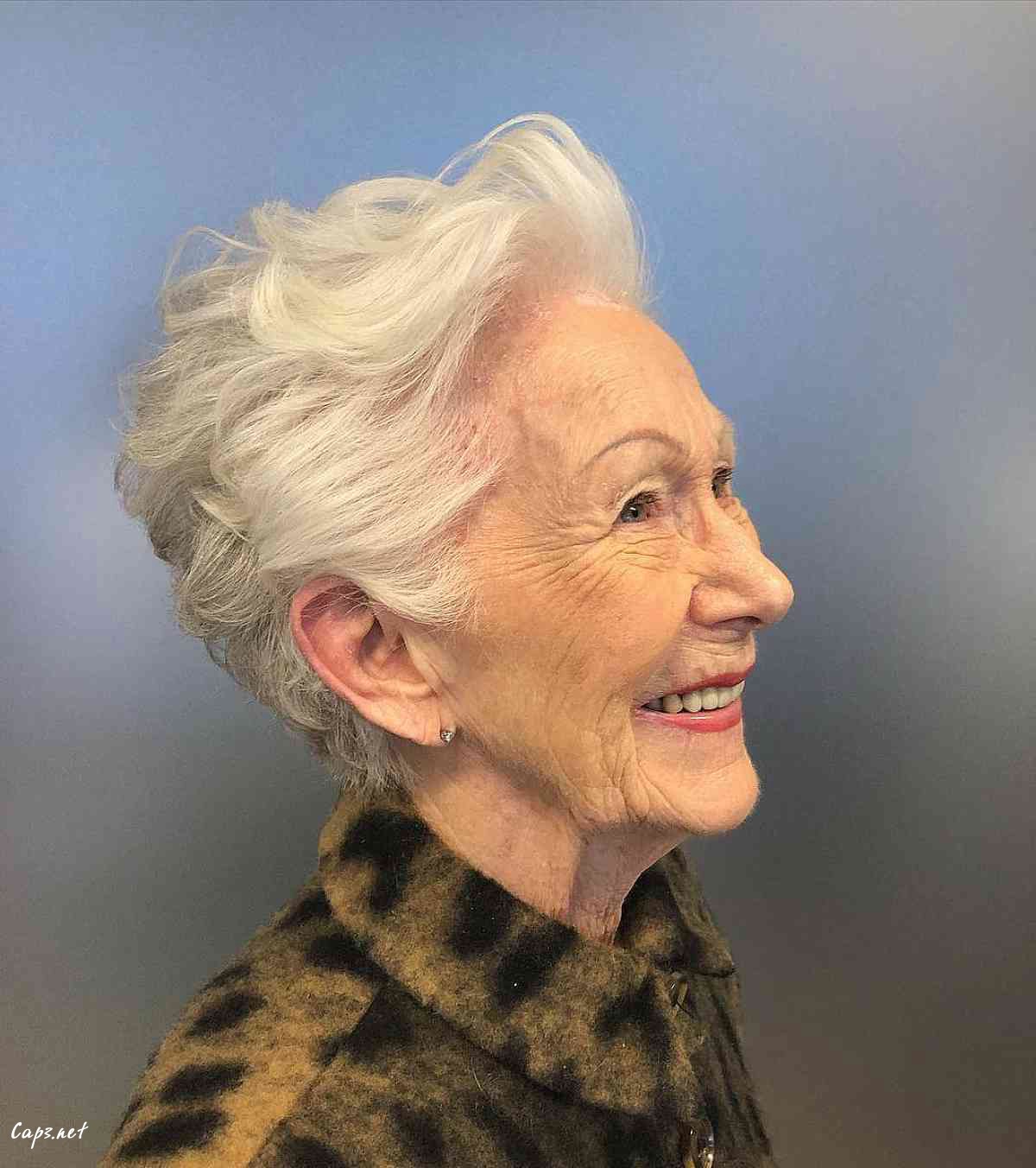 edgy short pixie cut with white hair for a woman in her 60s
