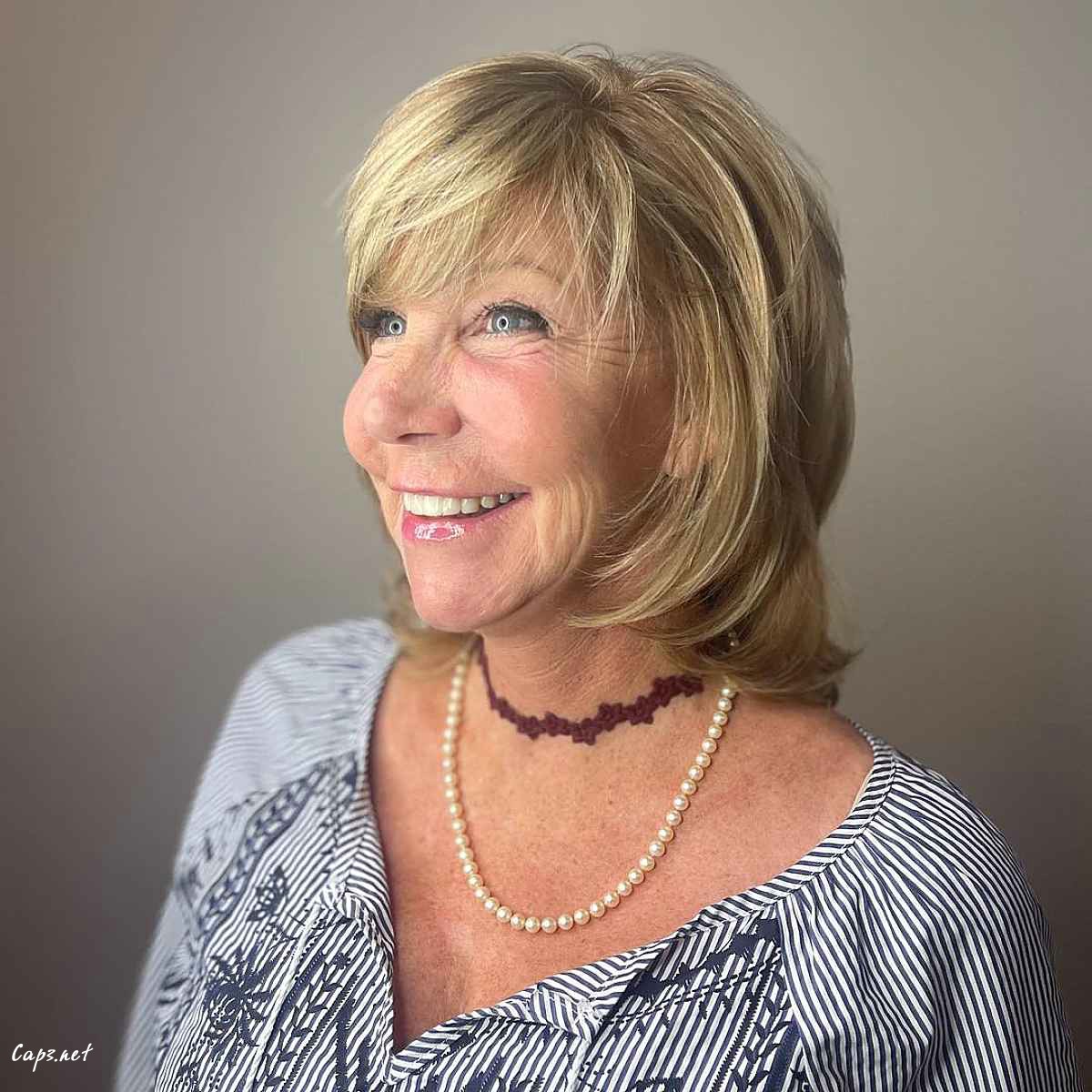 layered face framing cut with bangs