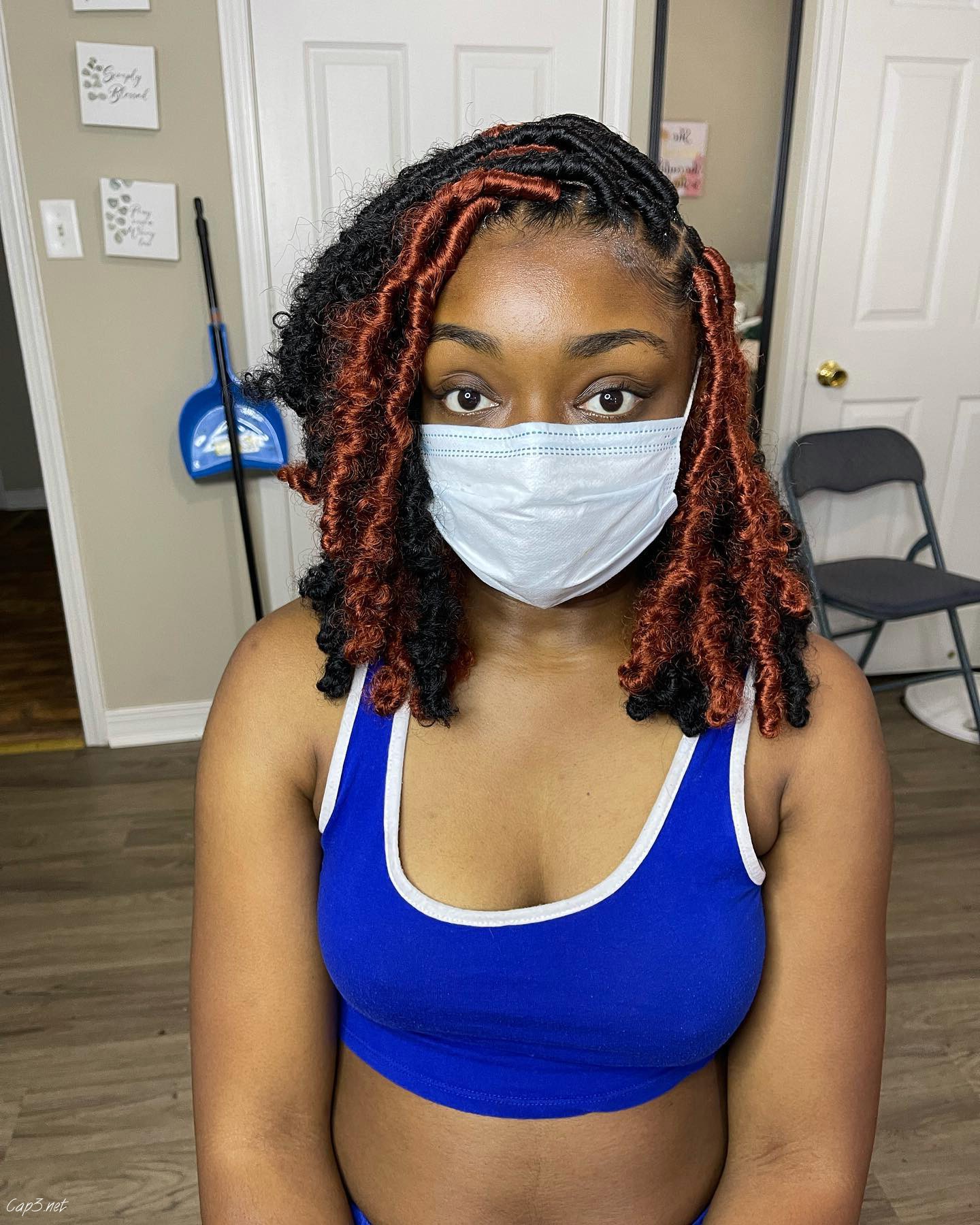 Black Hair With Pop Of Red Crochet Look