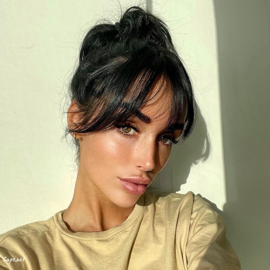 Dark Brown Updo With Curtain Bangs