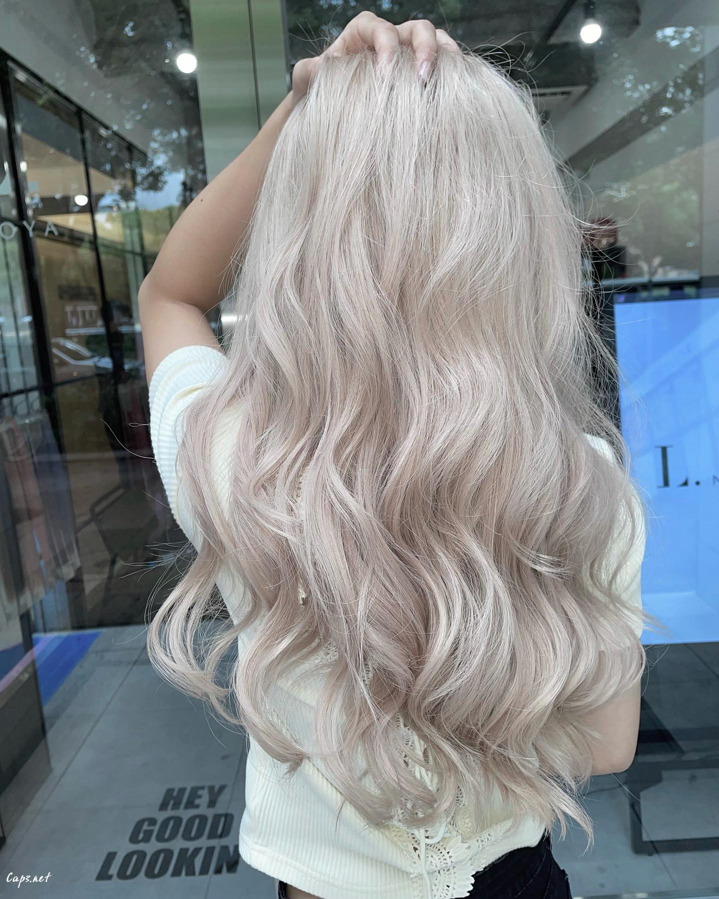 Icy White Voluminous Blonde Haircut