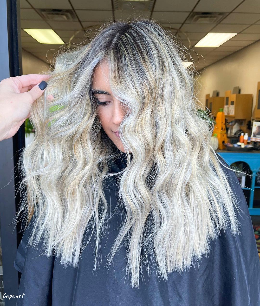 Wavy Blonde Curtain Bangs