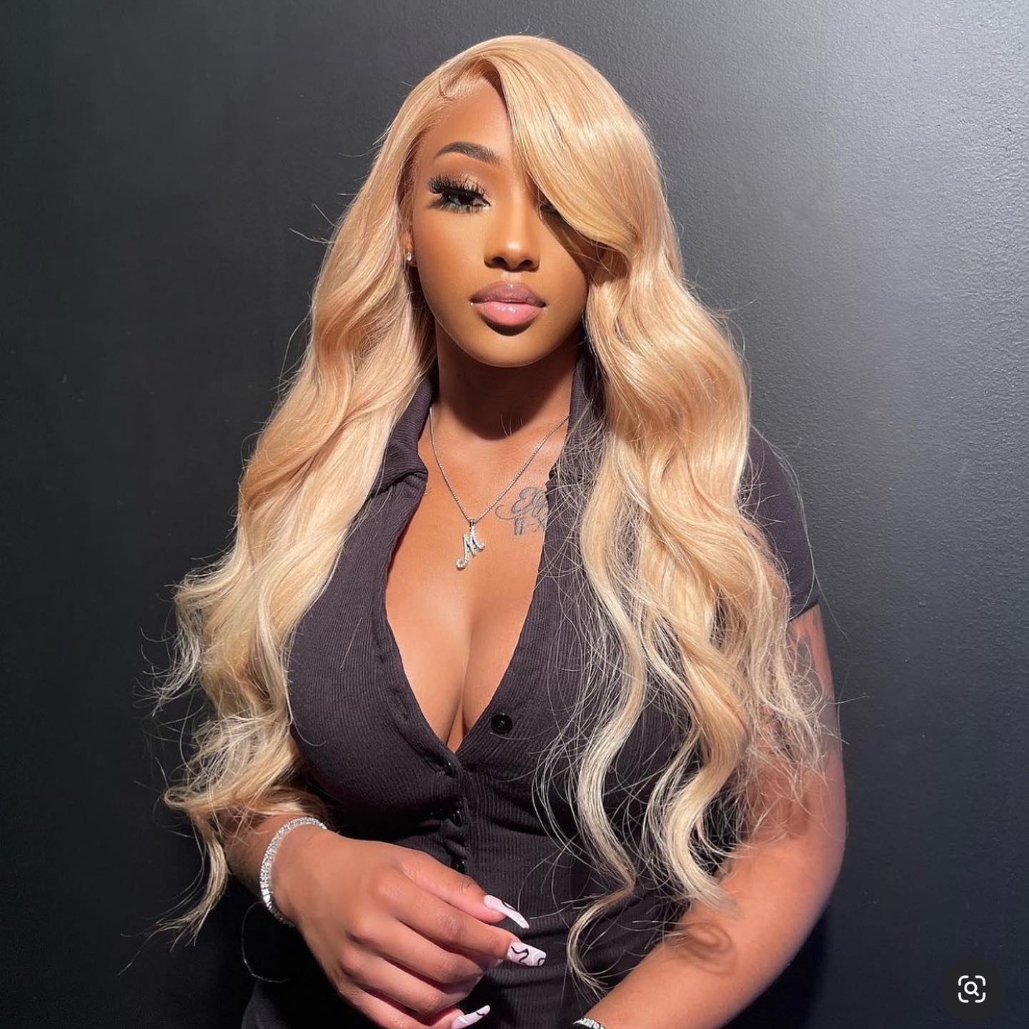 Long Blonde Wavy Hair With A Side Part