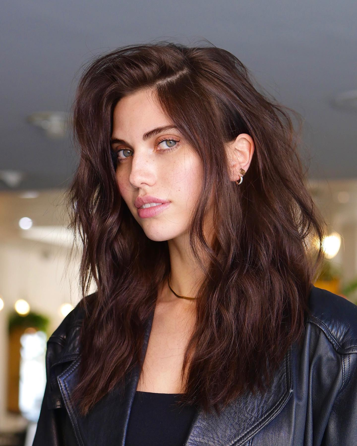 Messy Chopped Brown Hair With A Side Part