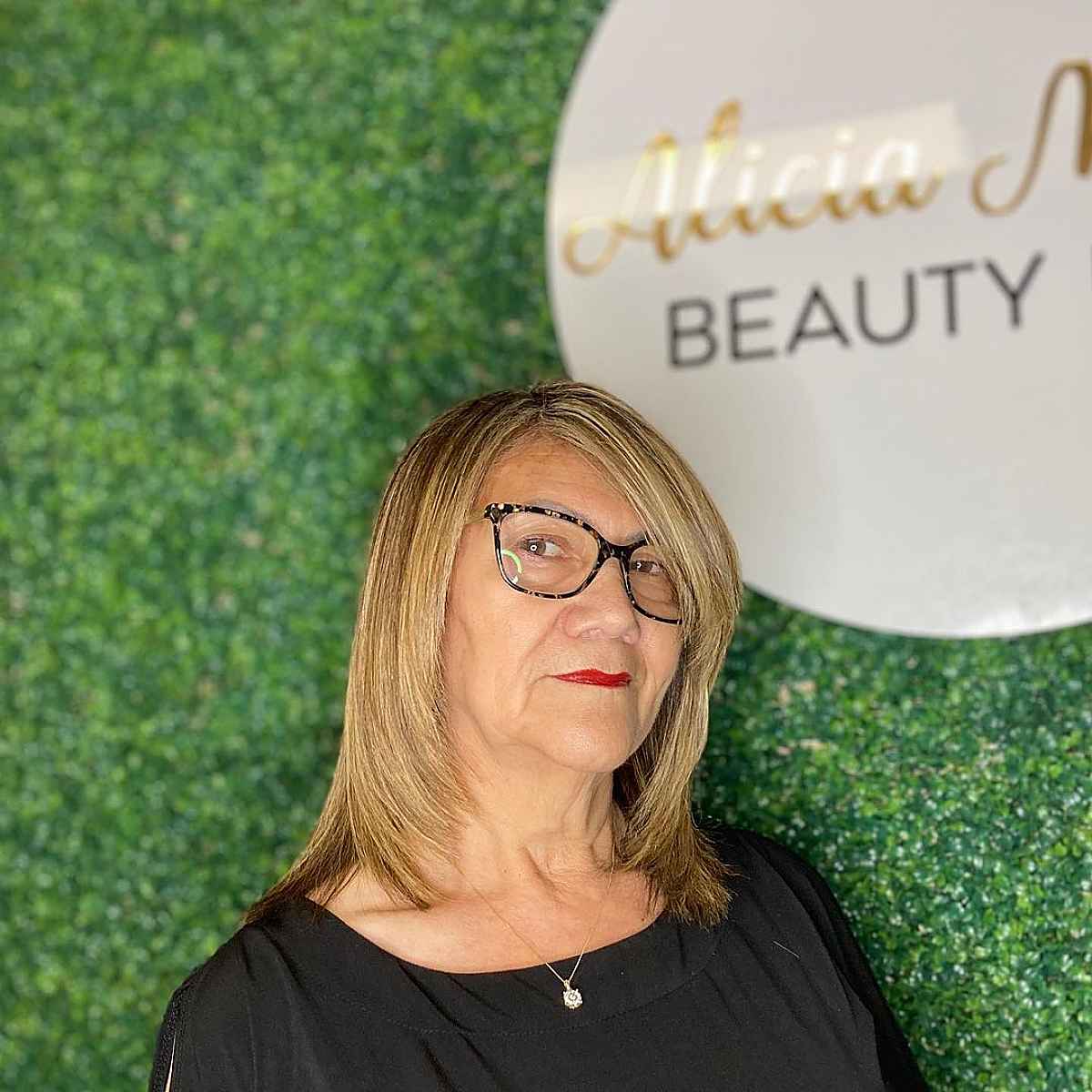 medium length layered cut for ladies passed sixty