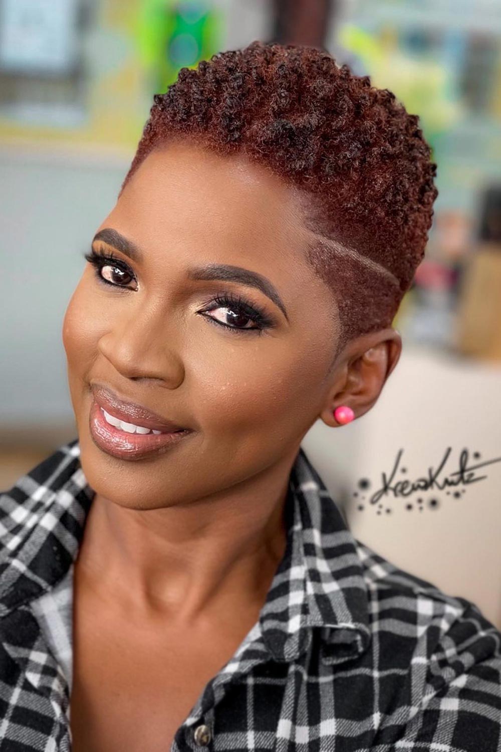 taper haircut women curly buzz cut