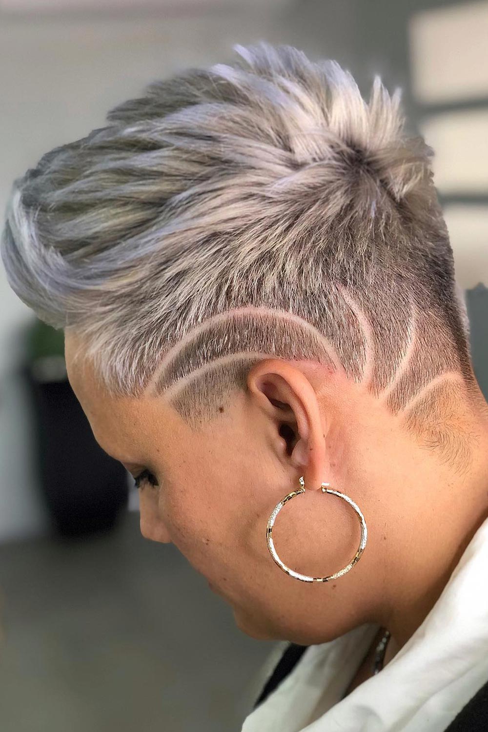 taper haircut women faux hawk