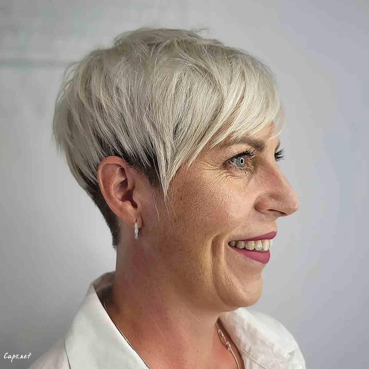 blonde side swept pixie with an undercut