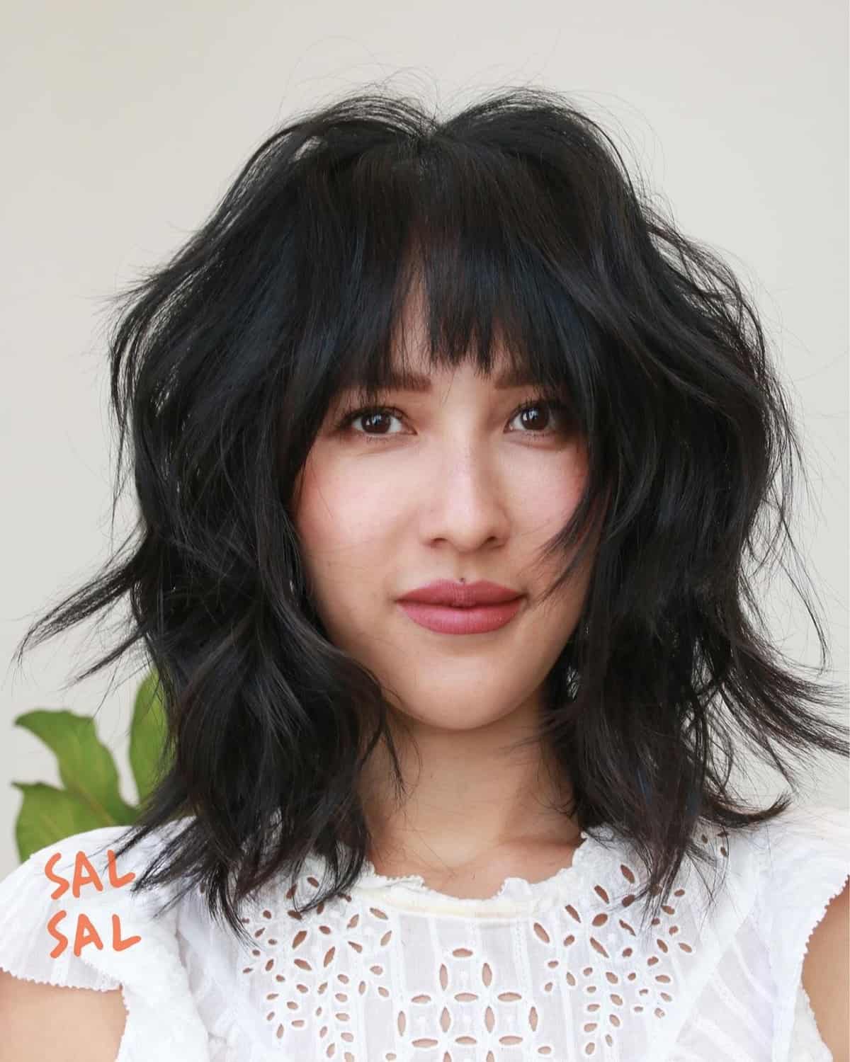 choppy shaggy bob haircut with bangs