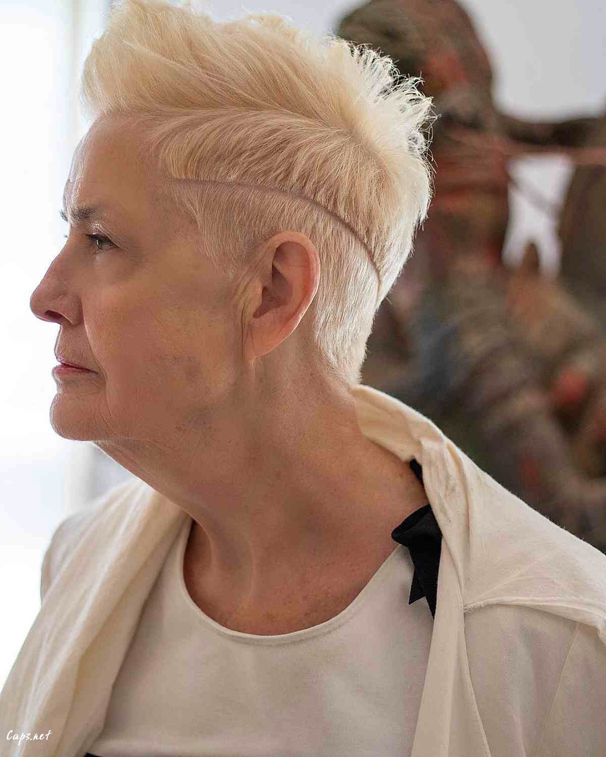 edgy pixie with hard part and undercut