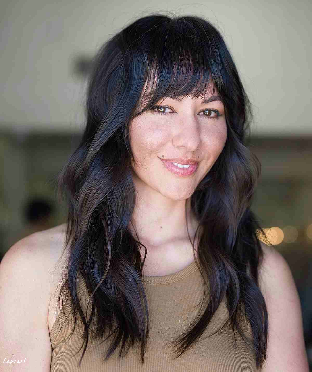 long straight hair with fringe bangs for a heart face