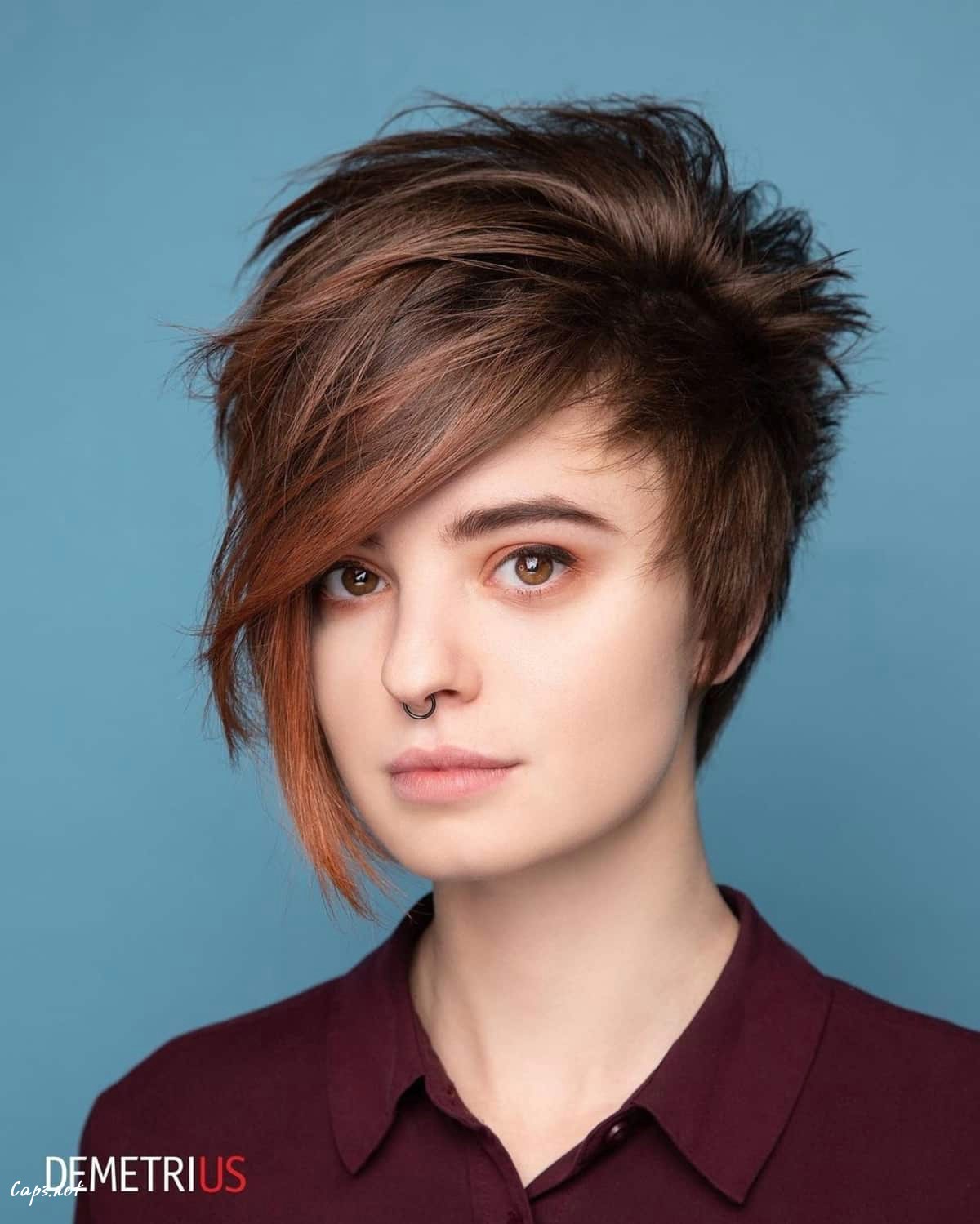 messy long pixie bob haircut with long side bangs