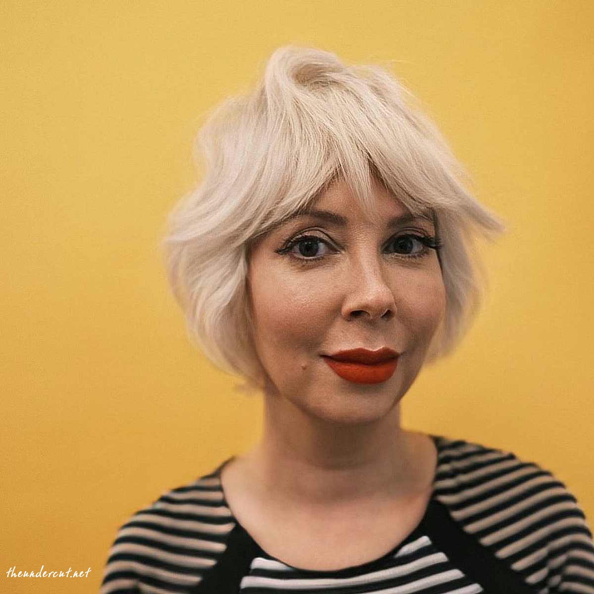 platinum blonde short shaggy bob hairstyle