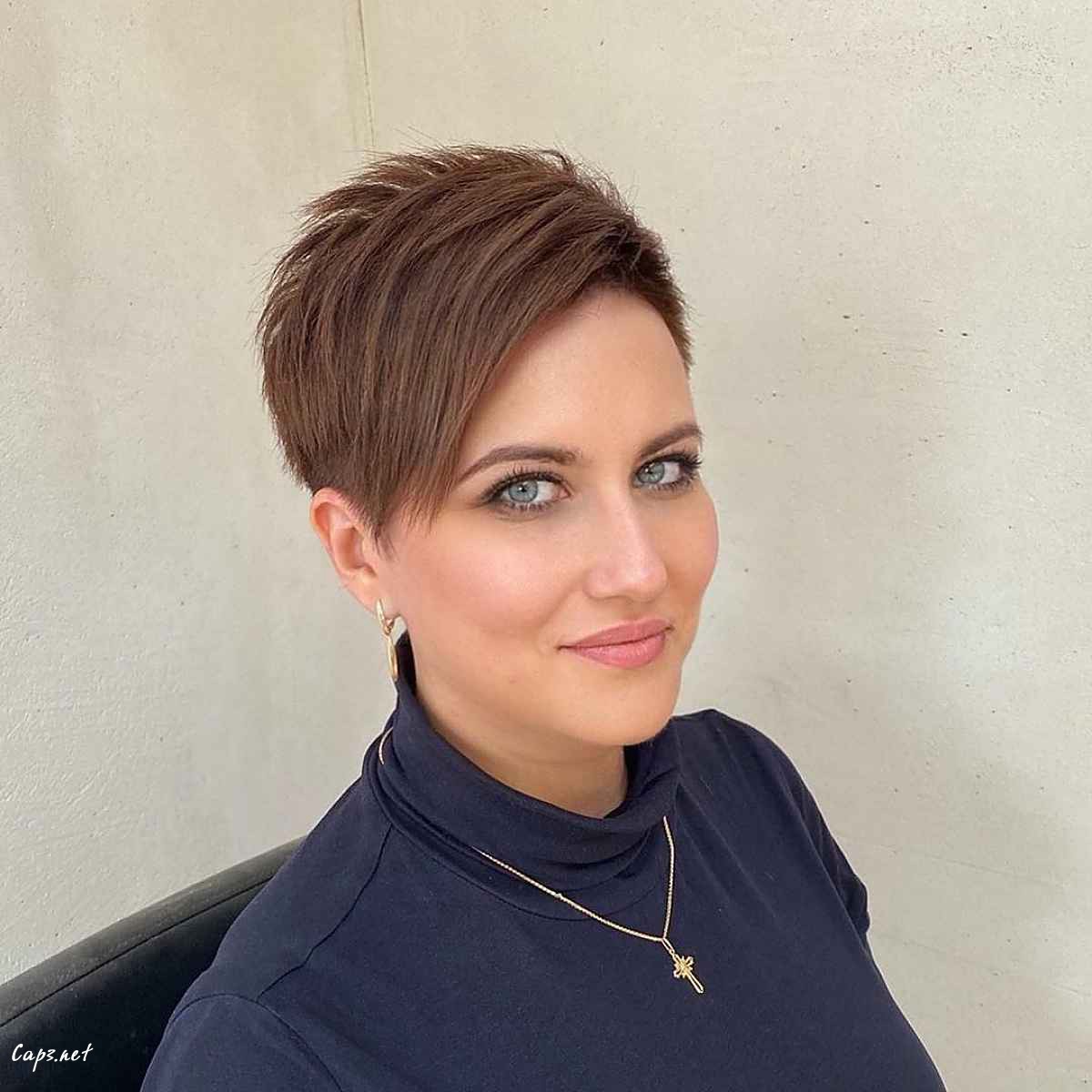 razor cut pixie with long bangs hairstyle