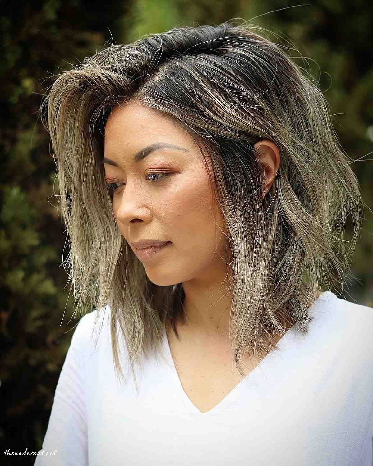shaggy bob with a deep side part
